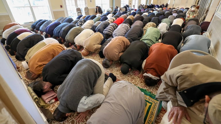 Dozens of Muslim faithful attend a Ramadan prayer service at...