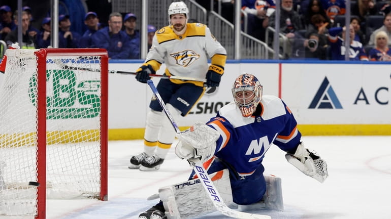 Semyon Varlamov #40 of the New York Islanders defends the...