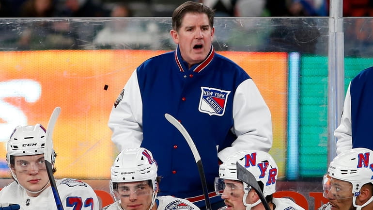 Head coach Peter Laviolette of the New York Rangers reacts...