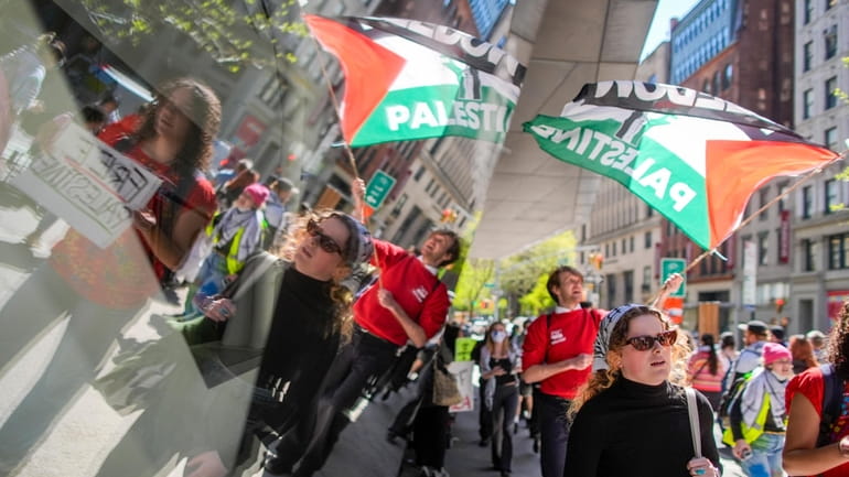 The New School students and pro-Palestinian supporters rally outside The...