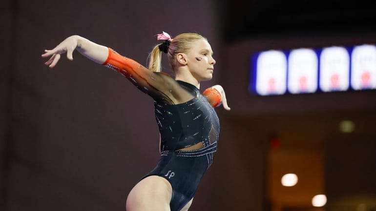 FILE -Oregon State's Jade Carey competes on the balance beam...