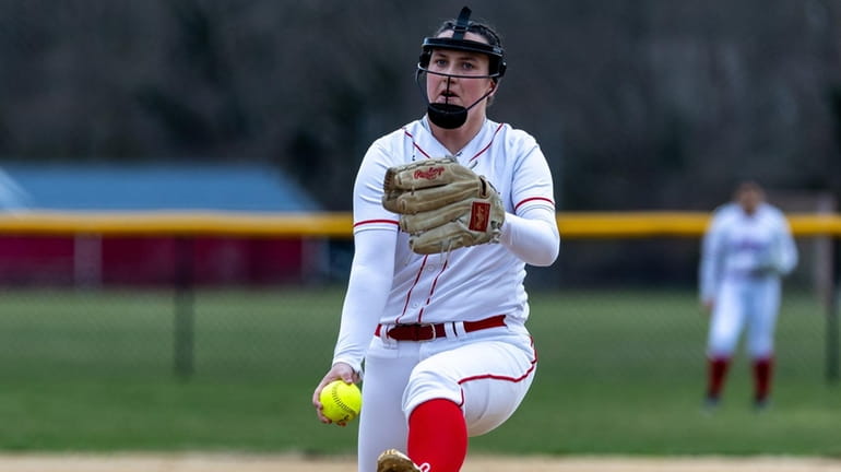 Bridget Barry of Bellport delivers a pitch during a Suffolk...