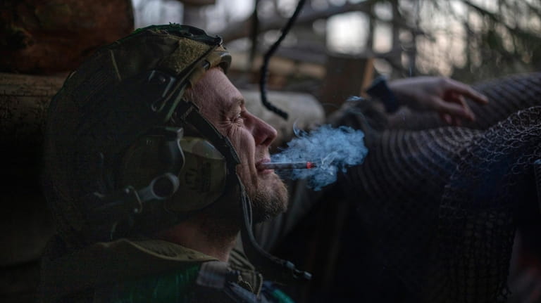 A Ukrainian serviceman from the Azov brigade, known by the...