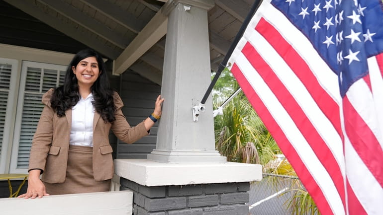 Florida state Rep. Anna Eskamani poses out front of her...