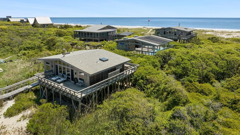 This Water Island property, which features two homes and a...
