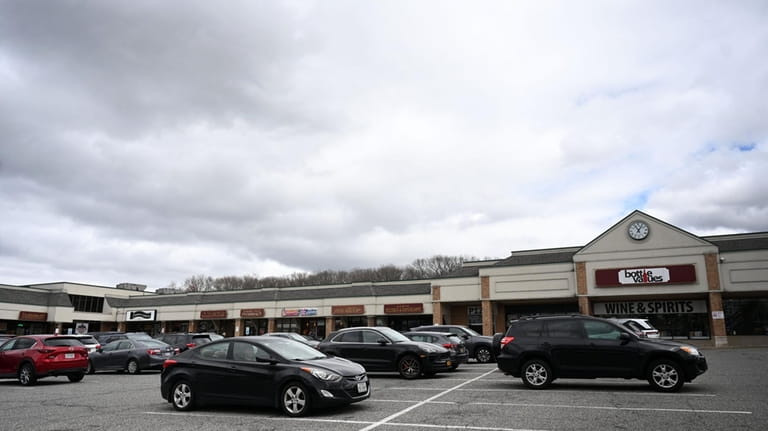 Old Bethpage Road is home to shopping centers with stores...