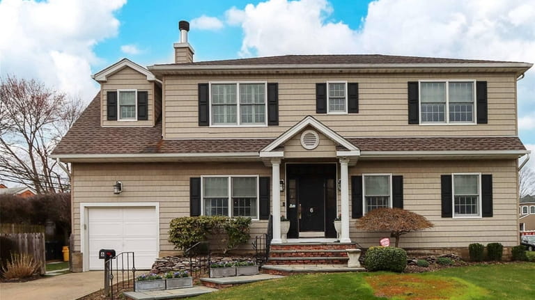 This nearly $1.3 million Old Bethpage home contains around 2,600...