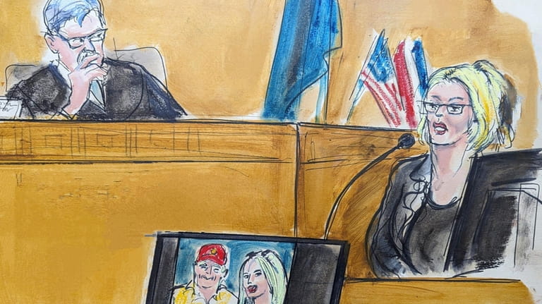 In this courtroom sketch, Stormy Daniels testifies at forrmer President...