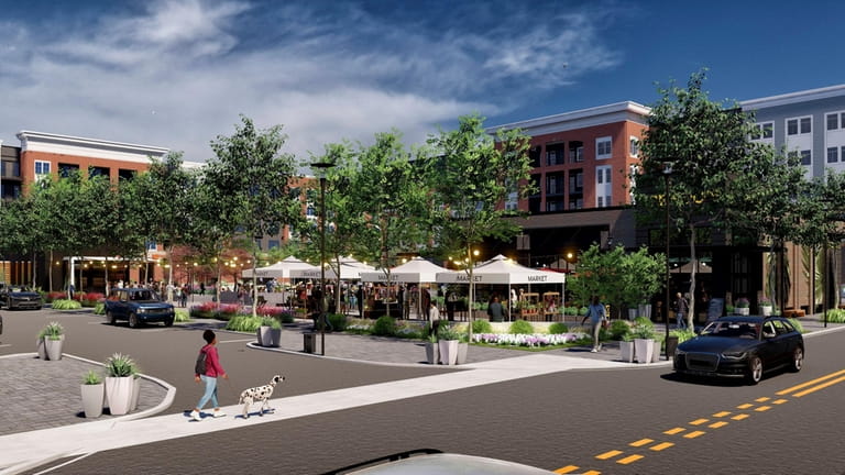 The "reimagined" Station Yards housing-retail-office project, seen in a rendering, will connect homes...