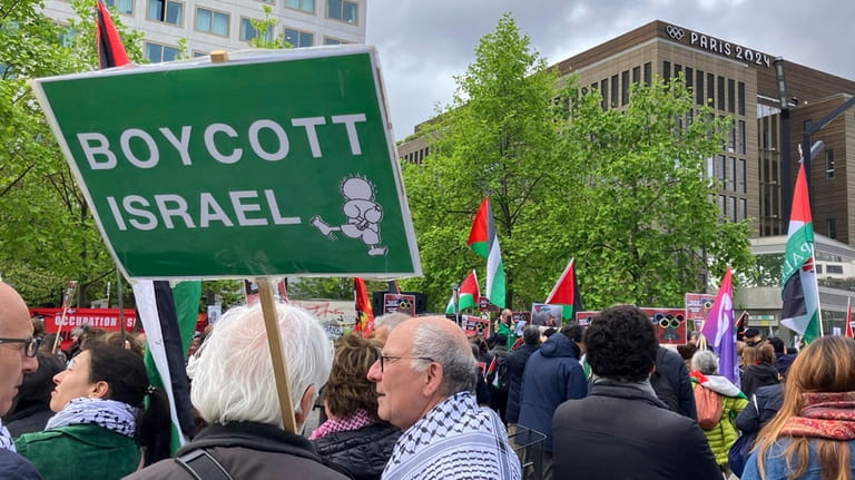 Demonstrators demanding the boycott of Israel during Olympic Games demonstrate...
