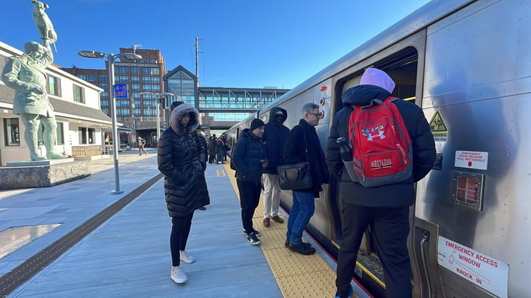 Commuters at the LIRR station in Mineola on Wednesday. A "less...
