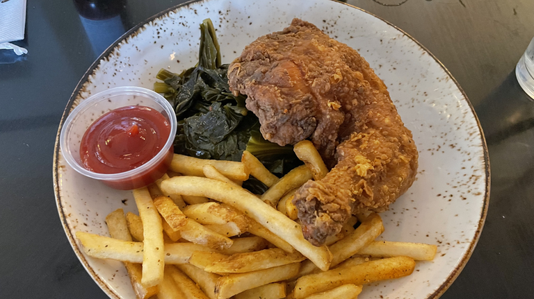  Fried chicken with collard greens at Melba’s, a Harlem restaurant.
