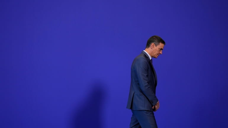 Spain's Prime Minister Pedro Sanchez walks at the Europe Summit...
