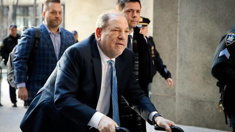Harvey Weinstein arrives at a Manhattan courthouse as jury deliberations...