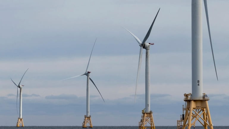 Turbines operate at the Block Island Wind Farm off the...