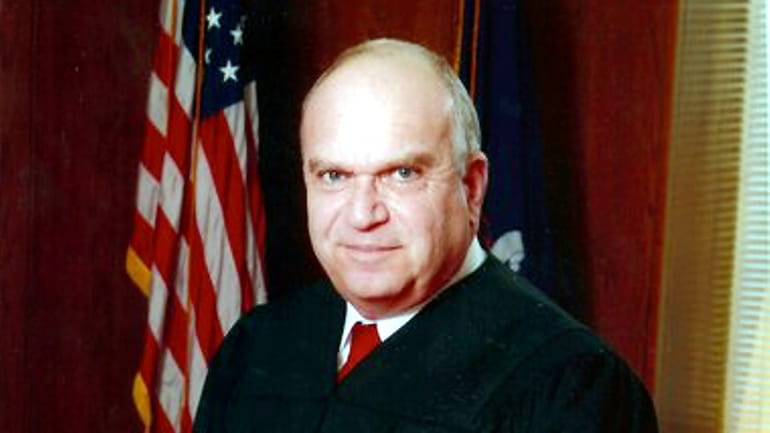 Nassau County Court Judge John L. Kase, who died on...