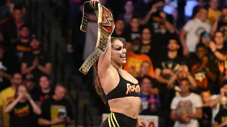 Ronda Rousey, who will compete at the WWE Evolution at...