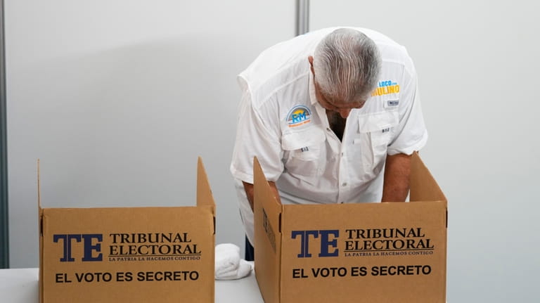 Achieving Goals presidential candidate Jose Raul Mulino marks his ballot...