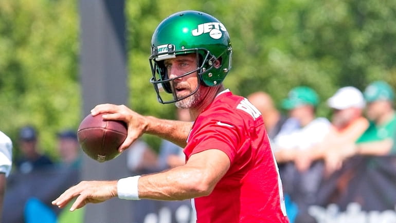 Jets QB Aaron Rodgers throws during training camp at the Atlantic Health...
