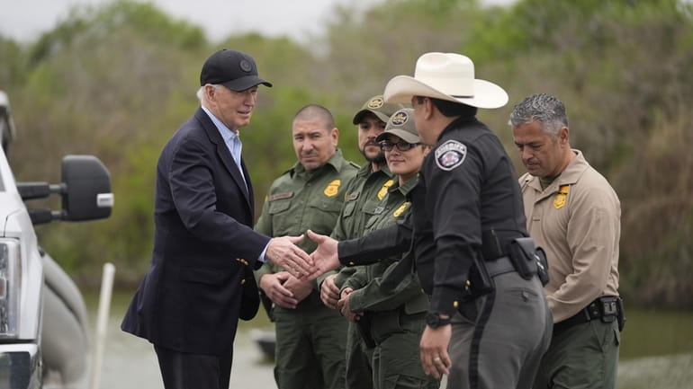 President Joe Biden talks with the U.S. Border Patrol and...
