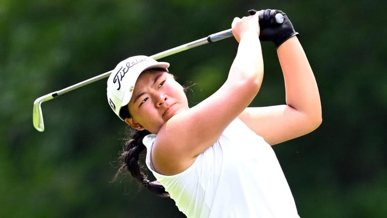 Madison Chen of Manhasset tees off from the eighth hole dyring the...