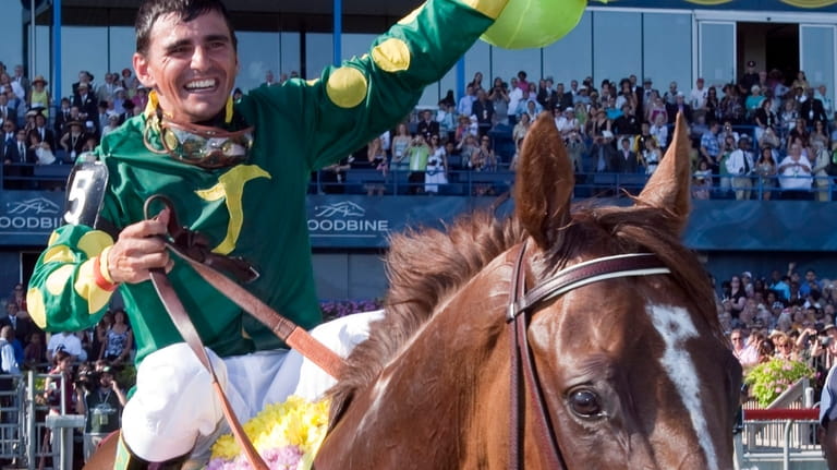 Eurico Rosa da Silva celebrates after winning the 151st Queen's...