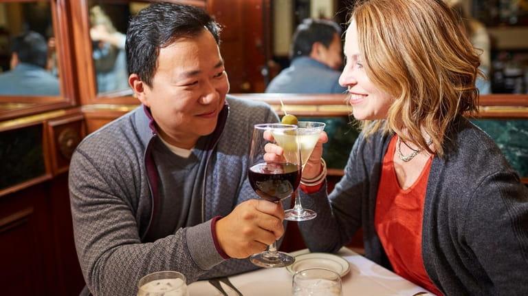 John and Marie Li enjoy a glass of cabernet sauvignon...