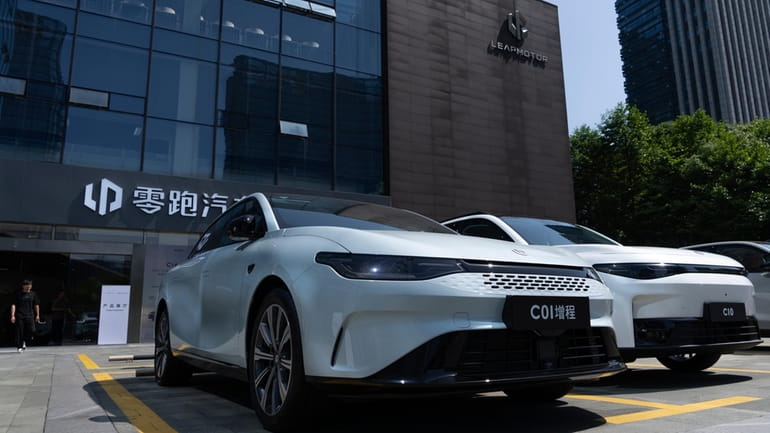 Leapmotor vehicles are parked outside a showroom in Hangzhou in...