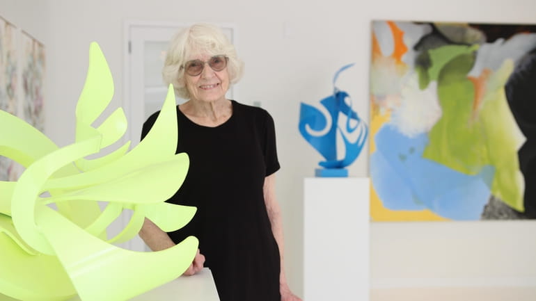 Celebrated sculptor Phyllis Baker Hammond with her vibrant aluminum sculptures...