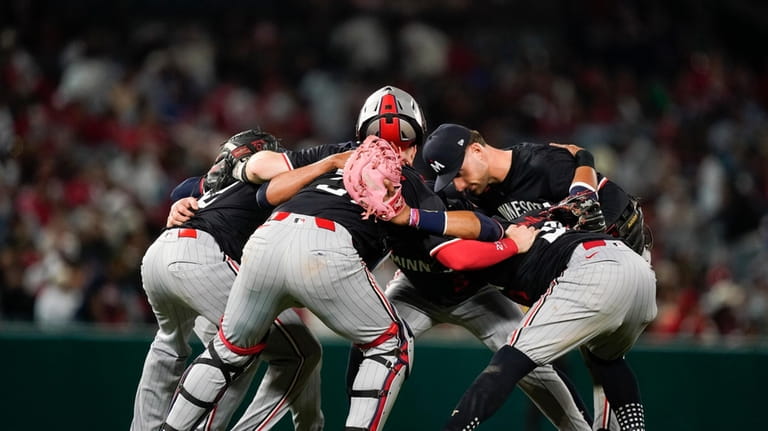 Minnesota Twins celebrate a win over the Los Angeles Angels...