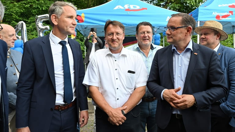 AfD members, Bjorn Hocke, left, Robert Sesselmann, centre, Stephan Brandner,...