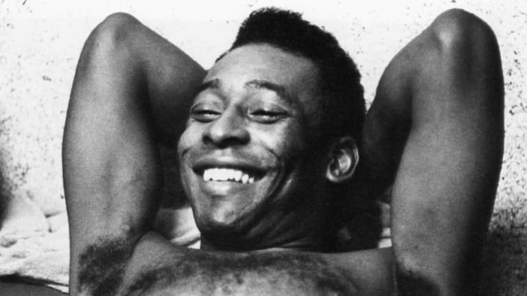 FILE - Brazilian soccer star Pele relaxes after a workout...