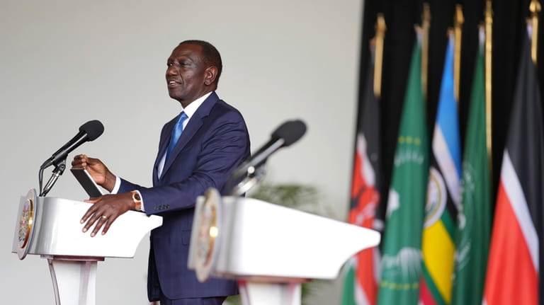 Kenyan President William Ruto gives an address during the launch...