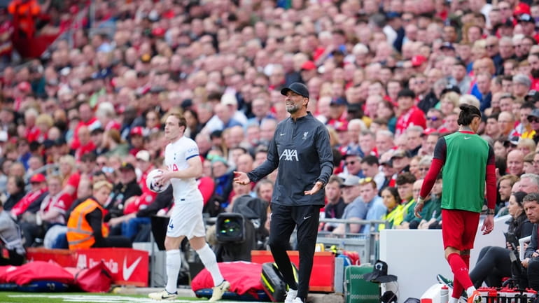 Liverpool's manager Jurgen Klopp, center, gestures during the English Premier...