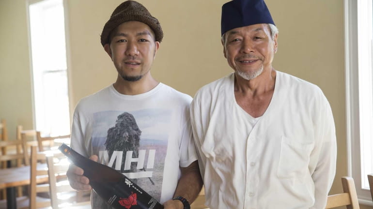 Yuki Mori, owner, left, and Akio Kon, sushi chef, at...