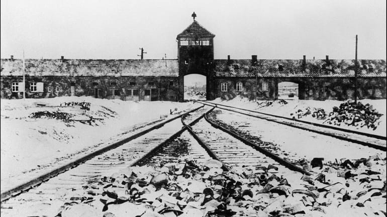 A picture taken in January 1945 depicts the Auschwitz-Birkenau extermination...