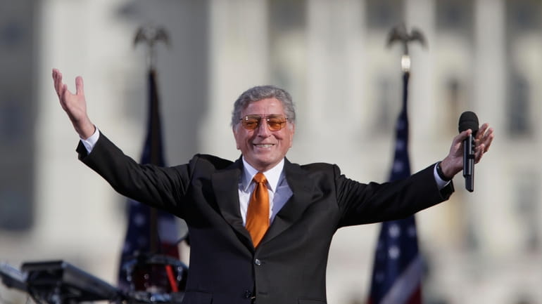 Singer Tony Bennett reacts to the crowd during his performance...