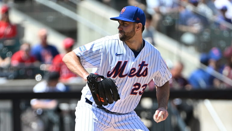 Mets starting pitcher David Peterson delivers against the Los Angeles...
