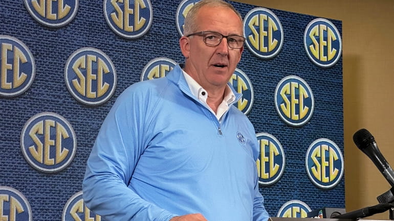 Southeastern Conference Commissioner Greg Sankey speaks to reporters during the...
