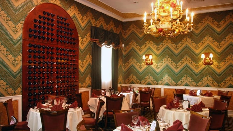 The warm and generous main dining room at La Pace...