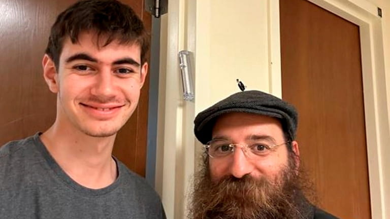 Hofstra freshman Aden Kosoi, left, with Rabbi Shmuel Lieberman of Chabad at...