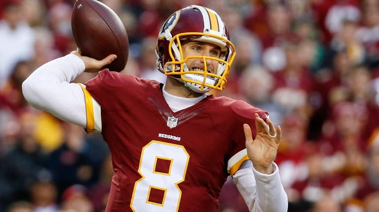 Washington Redskins quarterback Kirk Cousins (8) passes the ball during...