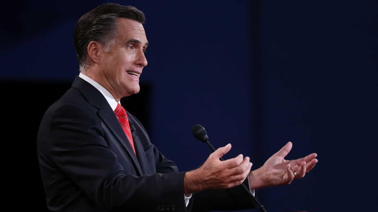 Republican presidential candidate, former Massachusetts Gov. Mitt Romney speaks during...