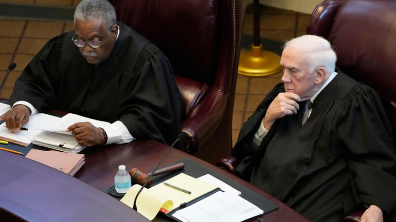Mississippi Supreme Court Presiding Justices Leslie D. King, left, and...