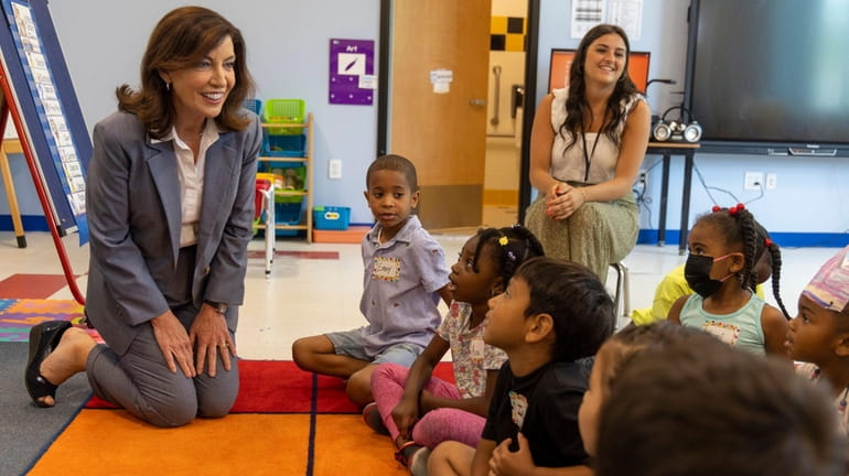 New York State Gov. Kathy Hochul talks with students Wednesday in Cierra Torres'...