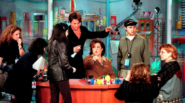 Staff members from "The Rosie O'Donnell Show" work on the...