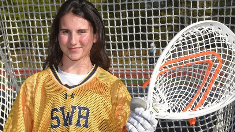 Angelina Price, a girl who plays as backup goalie on...