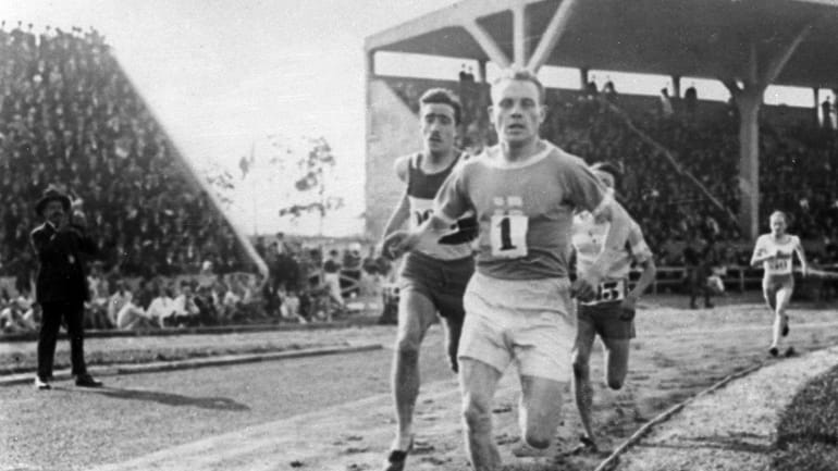 Paavo Nurmi, of Finland, leads the field during a track...