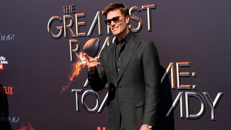Tom Brady poses at "The Greatest Roast of All Time:...