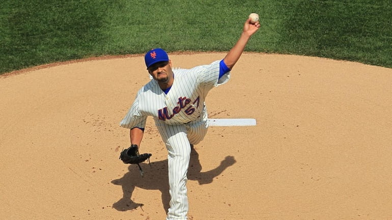 Johan Santana pitched six innings for the Mets and won...